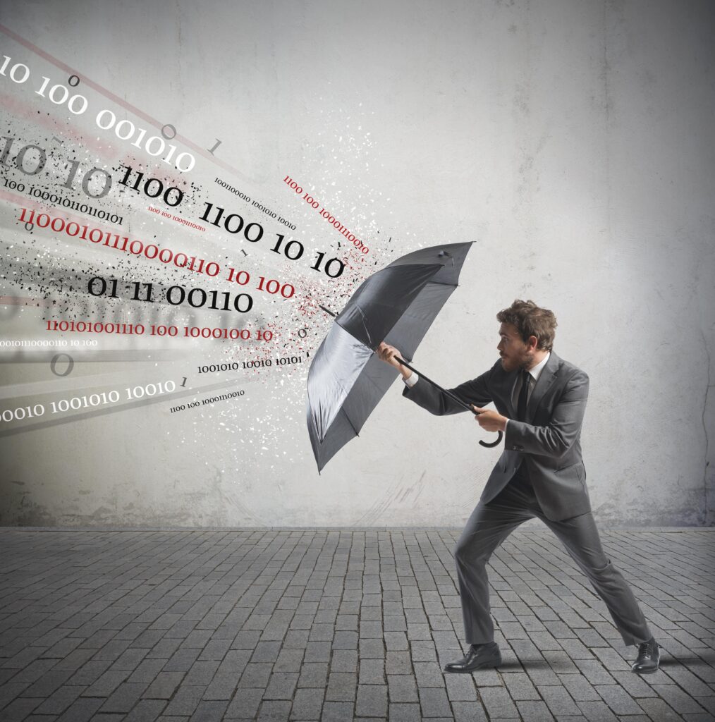 Businessman holding umbrella protecting against networx traffic, firewall concept.