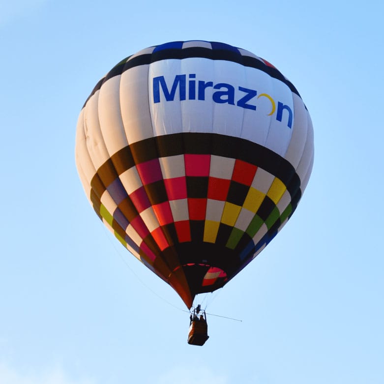 Colourful hot air ballon with "Mirazon" advertised on the side.